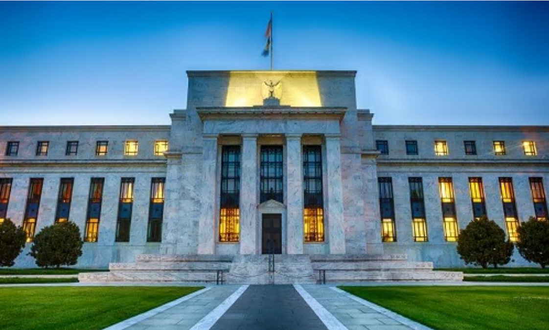 Fed's Powell suggests rate hikes unlikely in the short term